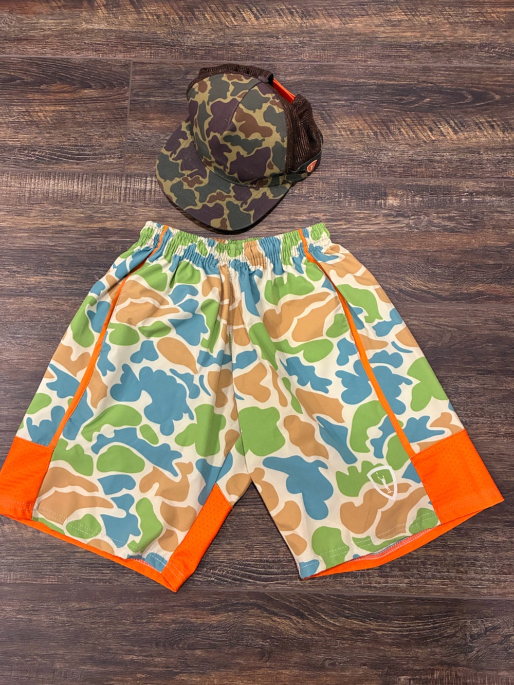 Adrenaline lacrosse Bright Orange-Trim Camouflage shorts and hat